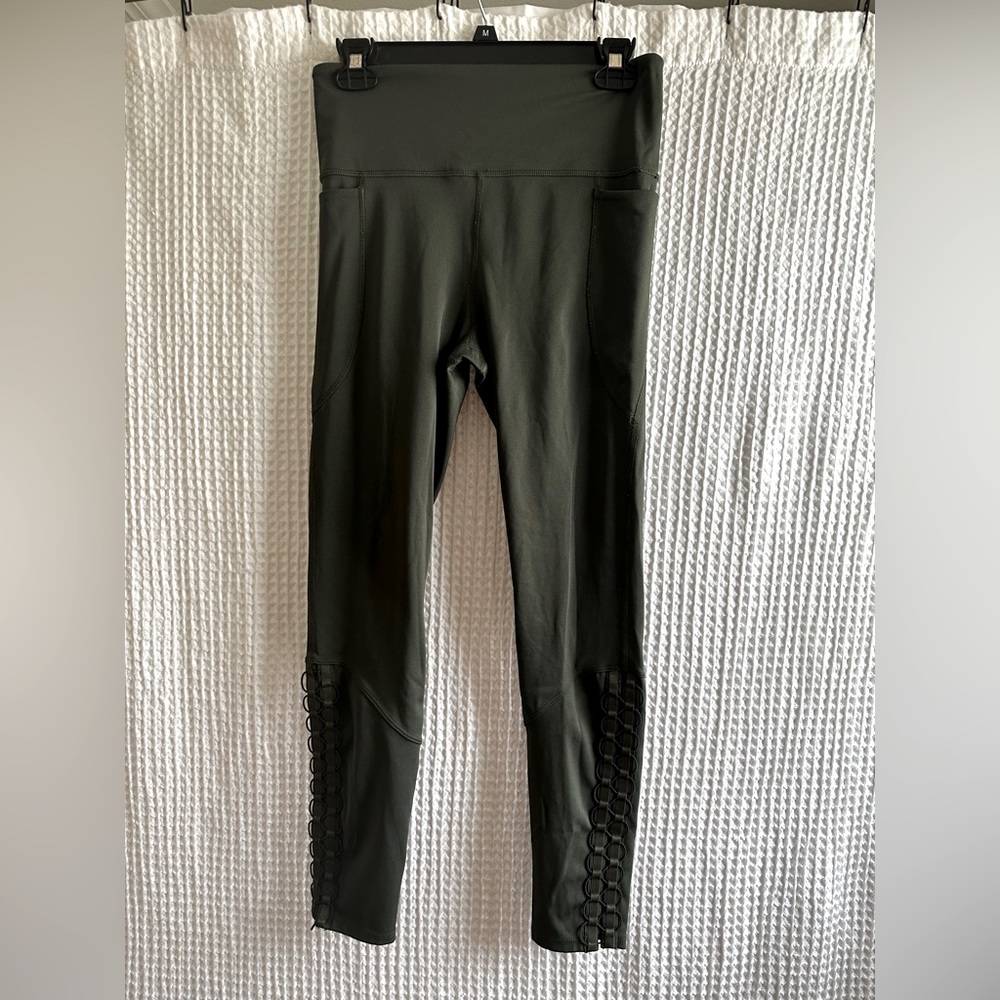 Dark green JoyLab leggings with lower calf detail